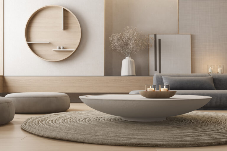 Warme moderne woonkamer met zandkleurige tinten, ronde vormen en natuurlijke materialen.