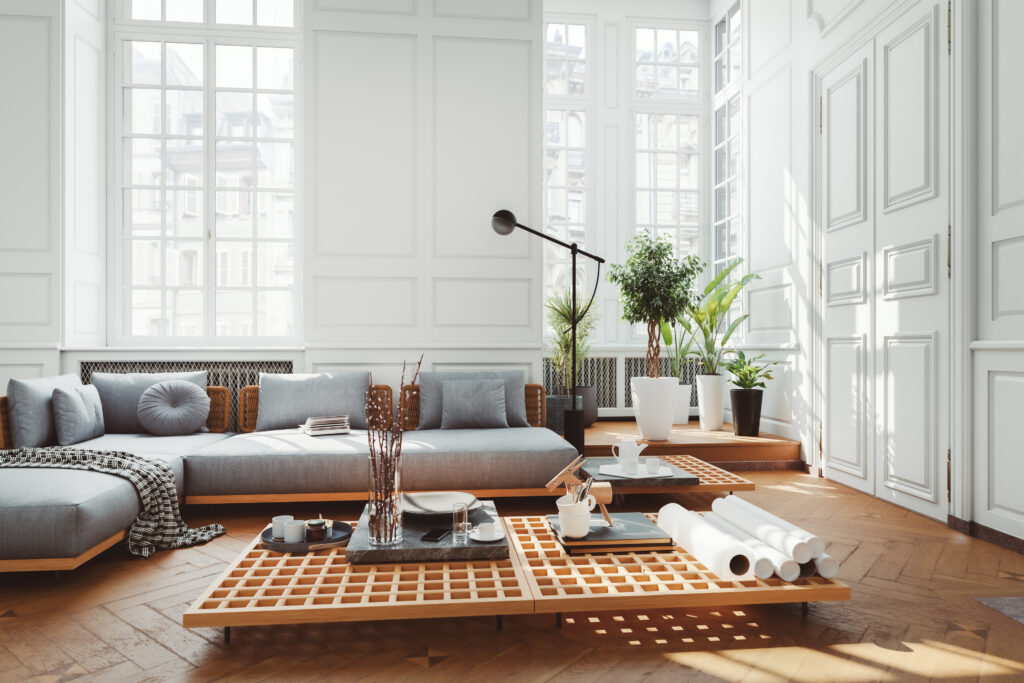Lichte moderne woonkamer met stijlvolle radiatorombouw die opgaat in het interieur.